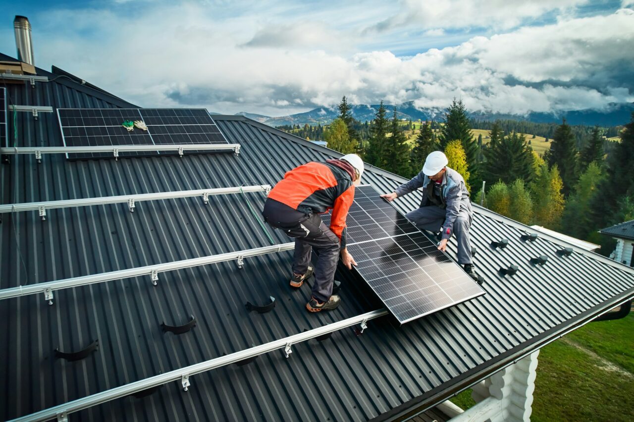 Solar system installation on top of house.jpg